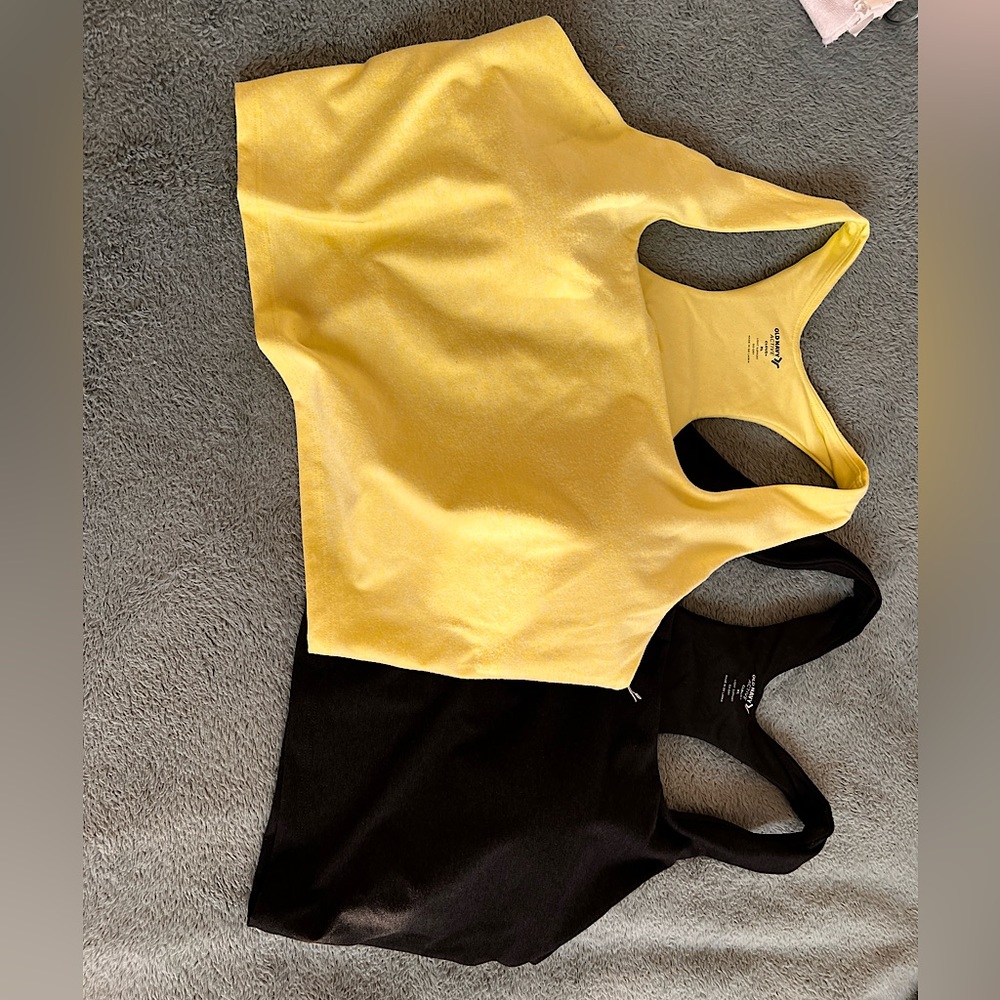 Two sports bras black and lime green XL with tags